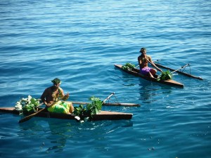 A couple of the Moorean men in their outriggers came to greet the ship as we anchored in the harbor.