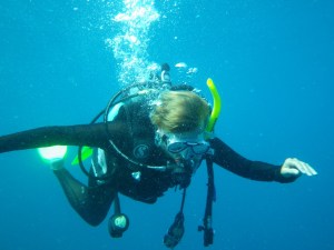 Charli scuba diving.
