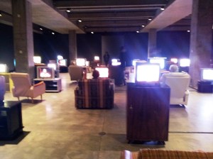 This display was a  very large room full of TVs each playing an interview  with a different person. I have no idea what  it meant.