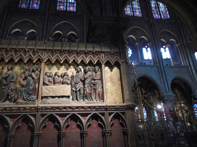 Everywhere I looked there were intricate carvings, statues, delicate stained glass windows - a glorious testament to the faith of those who built Notre' Dame.
