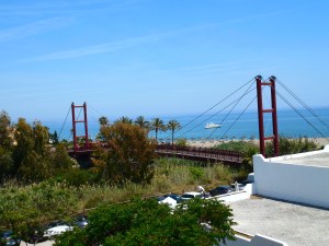 This is a footbridge that leads to the beach and the promenade along the beach.