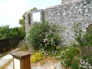 Ruins of the village located along the eastern slope of the Rock.