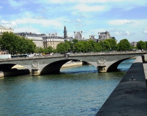 One of the many, many bridges across the busy Seine.