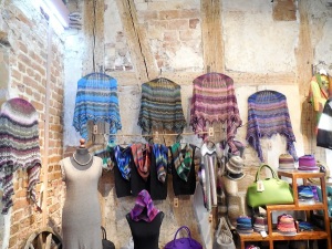 A lovely yarn shop with beautiful wearable art.