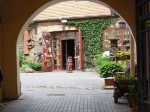Short tunnels into interior courtyards gave us a glimpse of homes, shops, and Vilnius Old Town life  