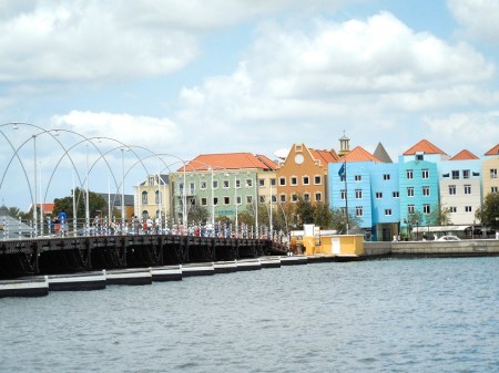 Queen Emma Bridge - a pontoon bridge that cruises open to allow ships in and out of the harbor and closed to let people into the city.