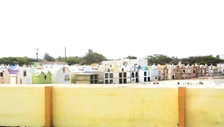 The local cemetery - cremation is the norm and Gift said that generations of a whole family share a tiny apartment building as they pass.